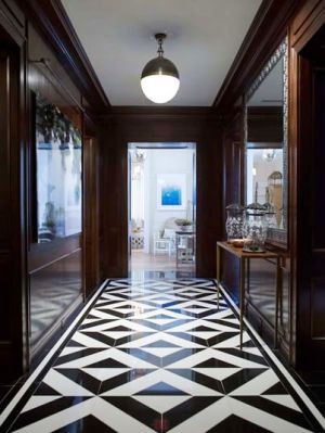 phoebe howard black white diamond marble floor entrance mahogany paneled.jpg